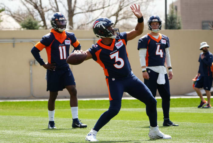 Denver Broncos quarterback Russell Wilson (3) works out during a Denver Broncos mini camp at UCHealth Training Center.